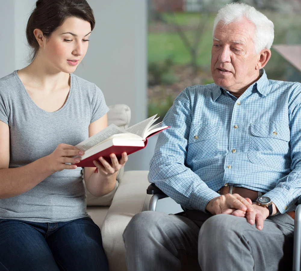 Caregiver WI Green Bay WI Reading To Client Caregiver WI Green Bay WI Reading To Client